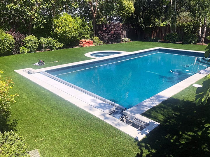 Why Artificial Turf Around the Pool Is Better than Real Grass