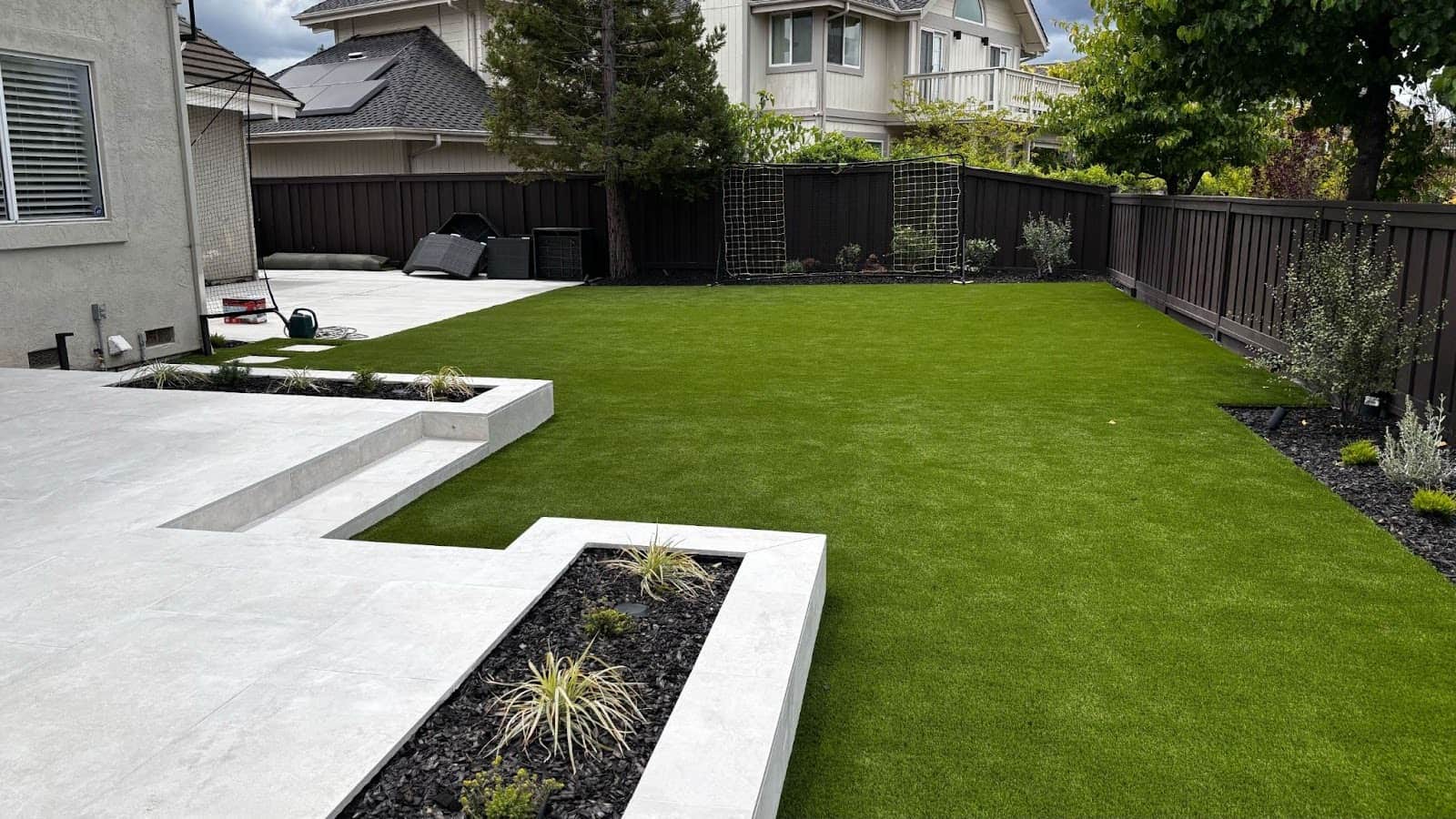 Patio with artificial turf garden